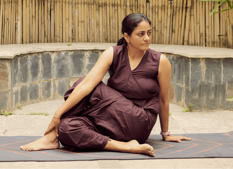 Shuchita practising yoga